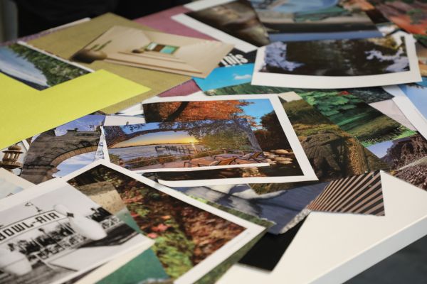 A pile of magazine pictures and book pages to be used in collages.