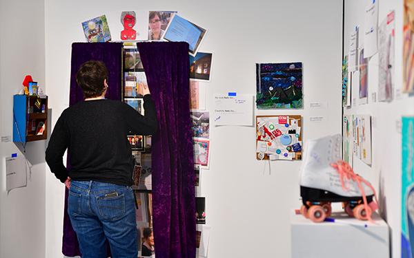 A viewer interacting with an installation in the exhibition titled Trace Layer Play 3.